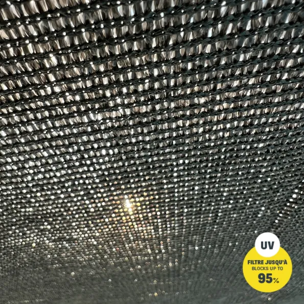 Vela de sombra transpirable para terraza o jardín, tejido aireado que ofrece protección solar eficaz.